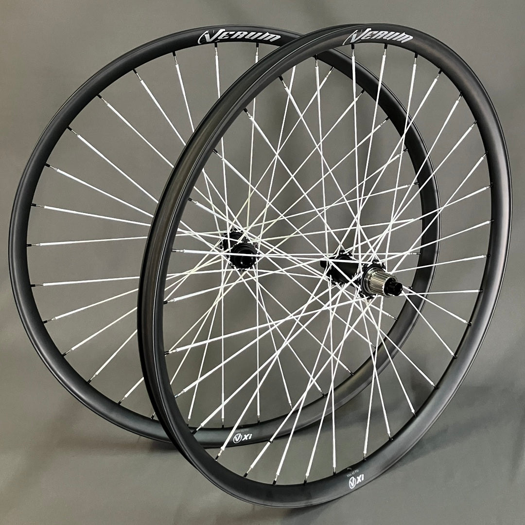 Verum X30 32" wheels featuring Berd spokes and Erase hooked flange hubs.
