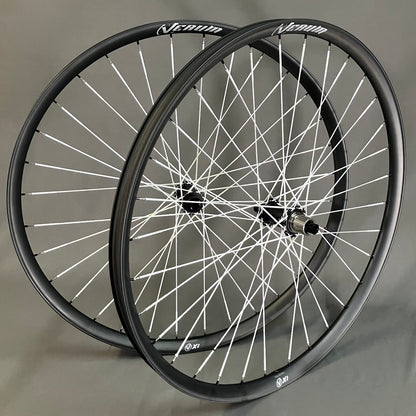 Verum X30 32" wheels featuring Berd spokes and Erase hooked flange hubs.